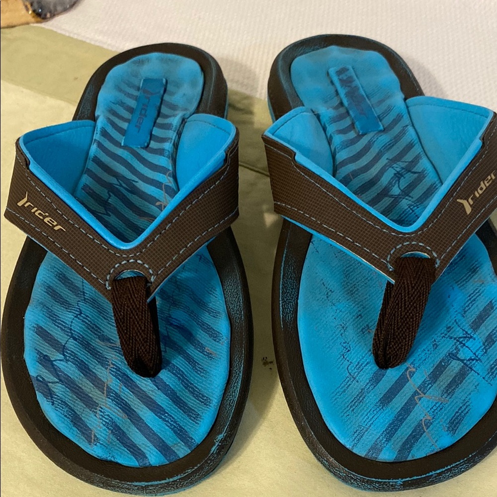 Riders Blue and Black sandals, overall structure in good condition